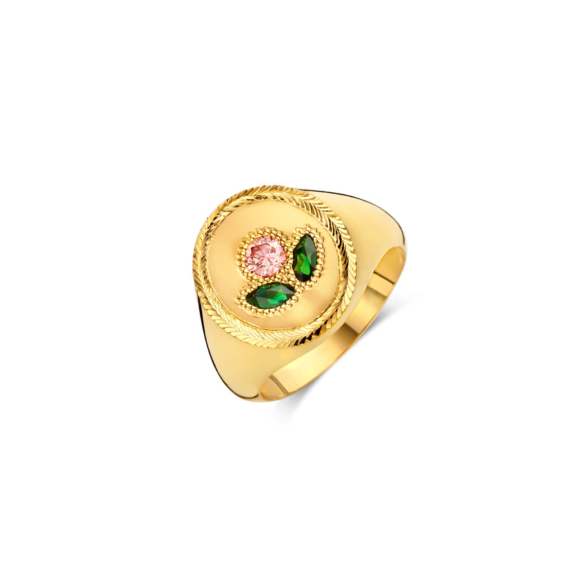 Gold ring with a pink diamond and tsavolites in the shape of a tulip.