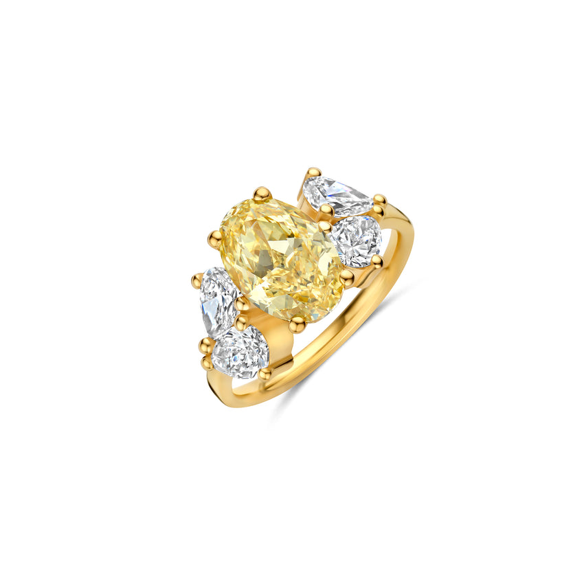 Solar Ring with a center oval 3ct yellow diamond, flanked by 4 pear shaped diamonds.