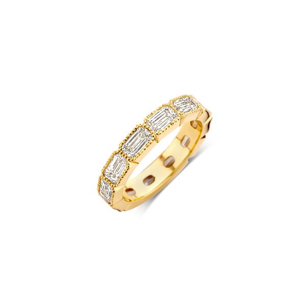 Golden ring surrounded by emerald cut diamonds set with miligrain.