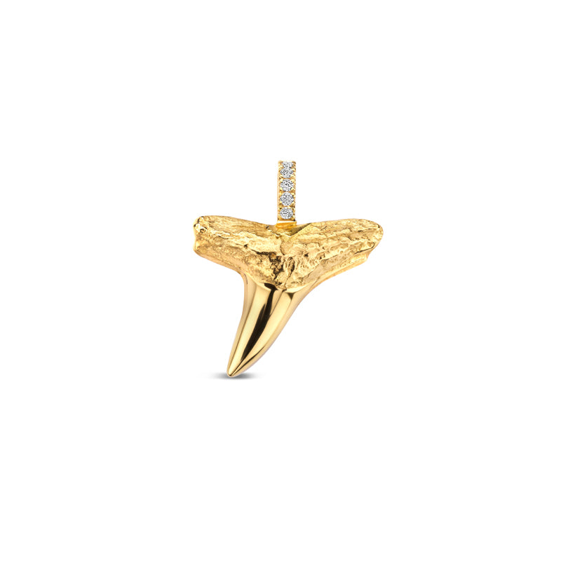 Gold shark tooth pendant with embedded diamonds.