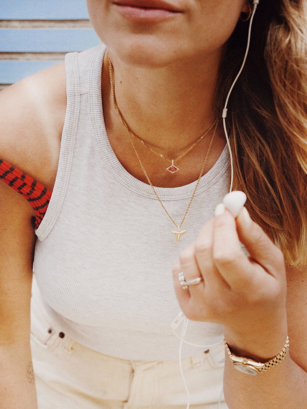 Shark tooth charm, Lozenge charm on chains.