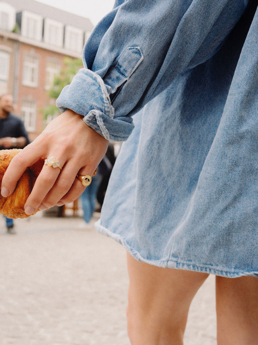Solar ring and tulip signet ring.