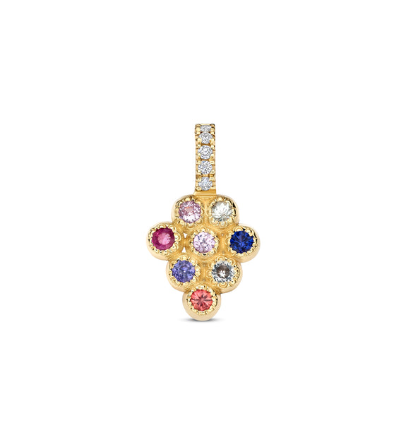 Gold pendant with colorful gemstones on a white background