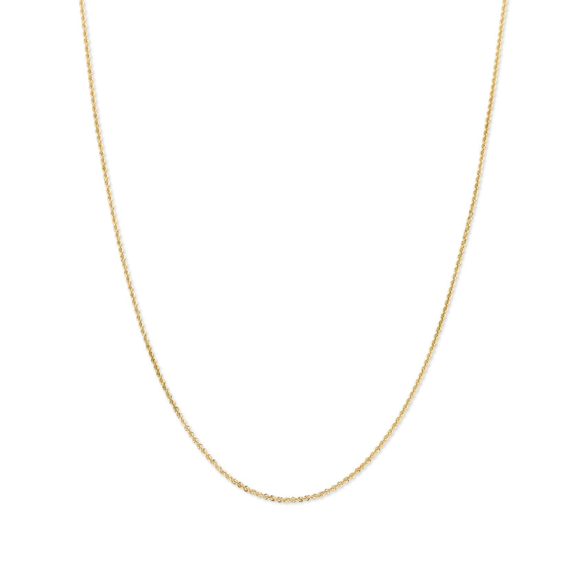 Gold chain necklace on a white background