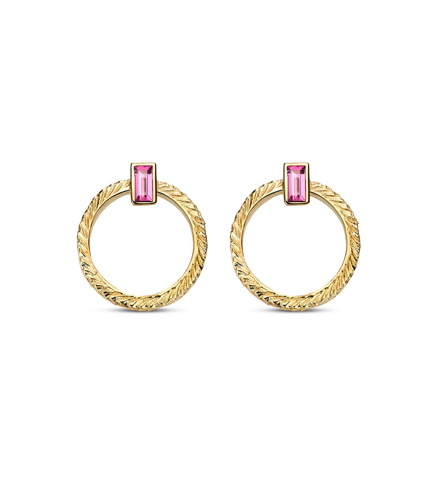 Gold hoop earrings with pink gemstones on a white background