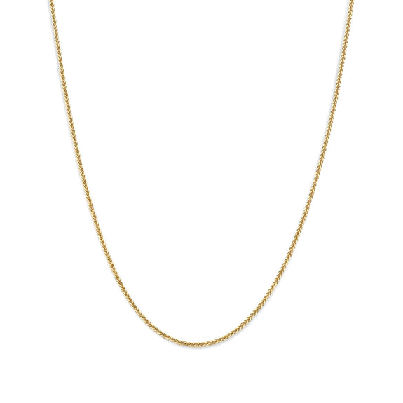 Gold chain necklace on a white background